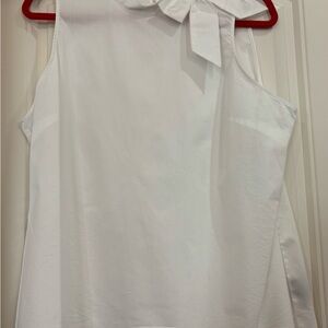 Chic White Sleeveless Blouse with Bow Accent